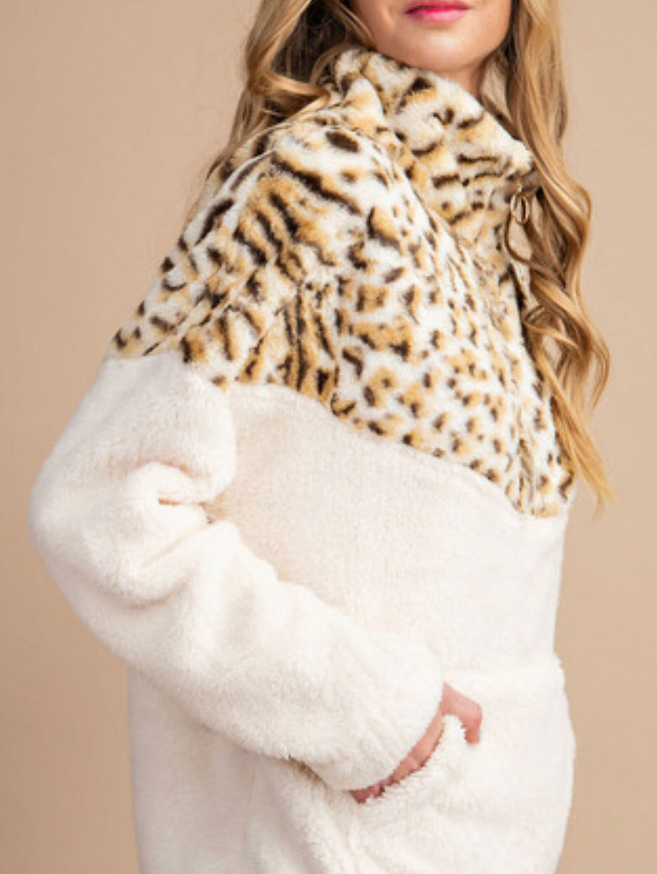 Snow Leopard Quarter Zip Sweater